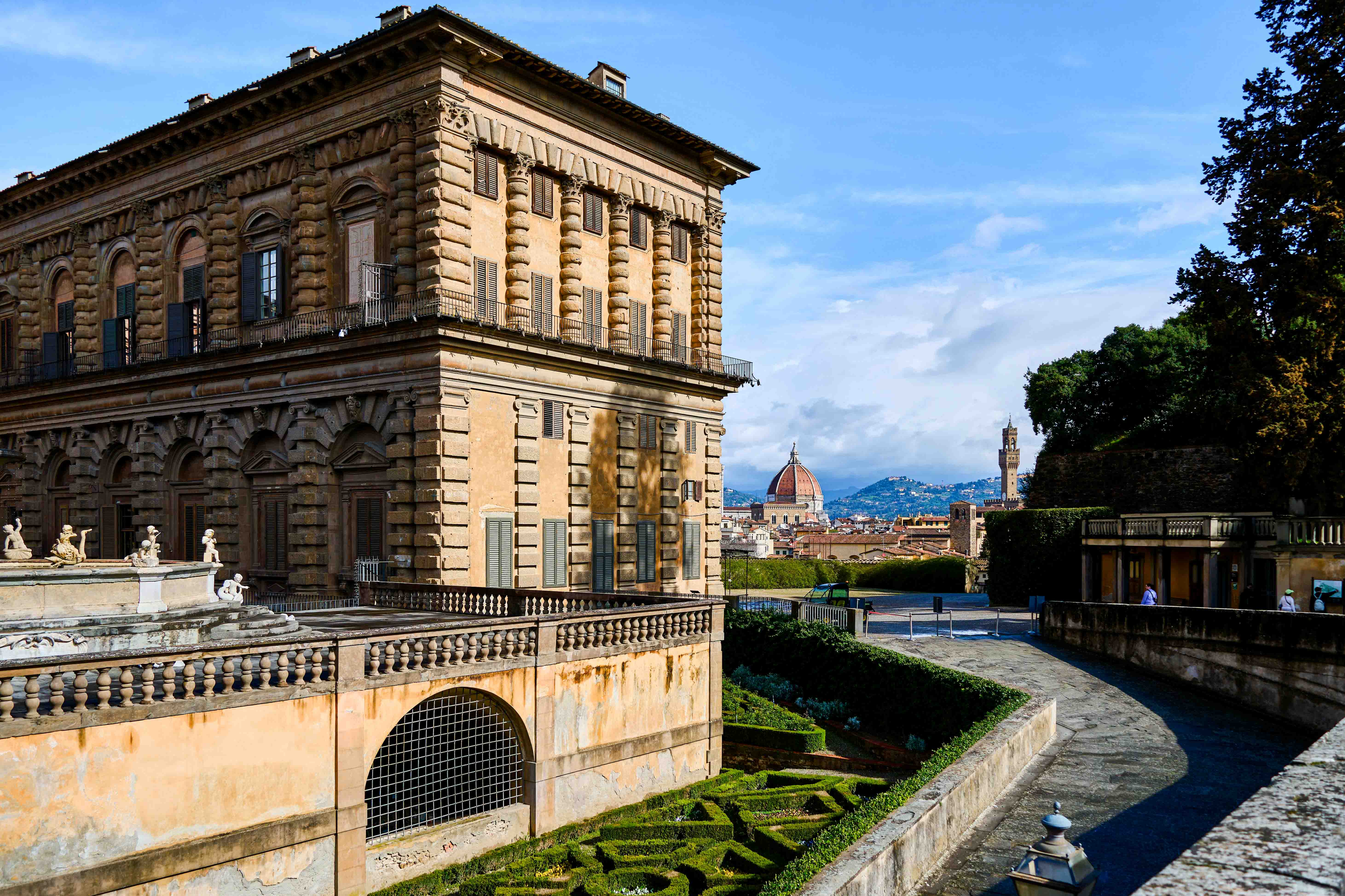 A view of Pitti Palace in Florence with the Duomo in the distance. 